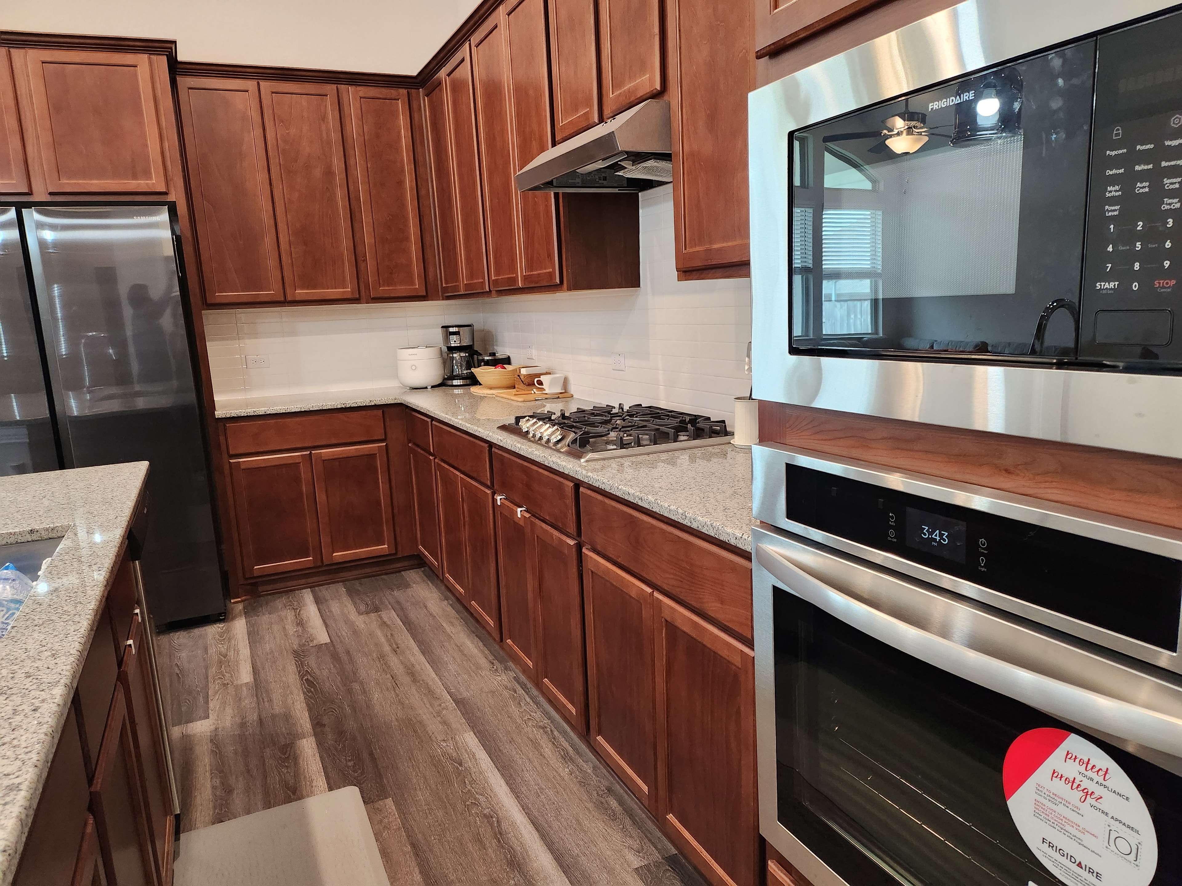 Kitchen with wood cabinets and stainless appliances