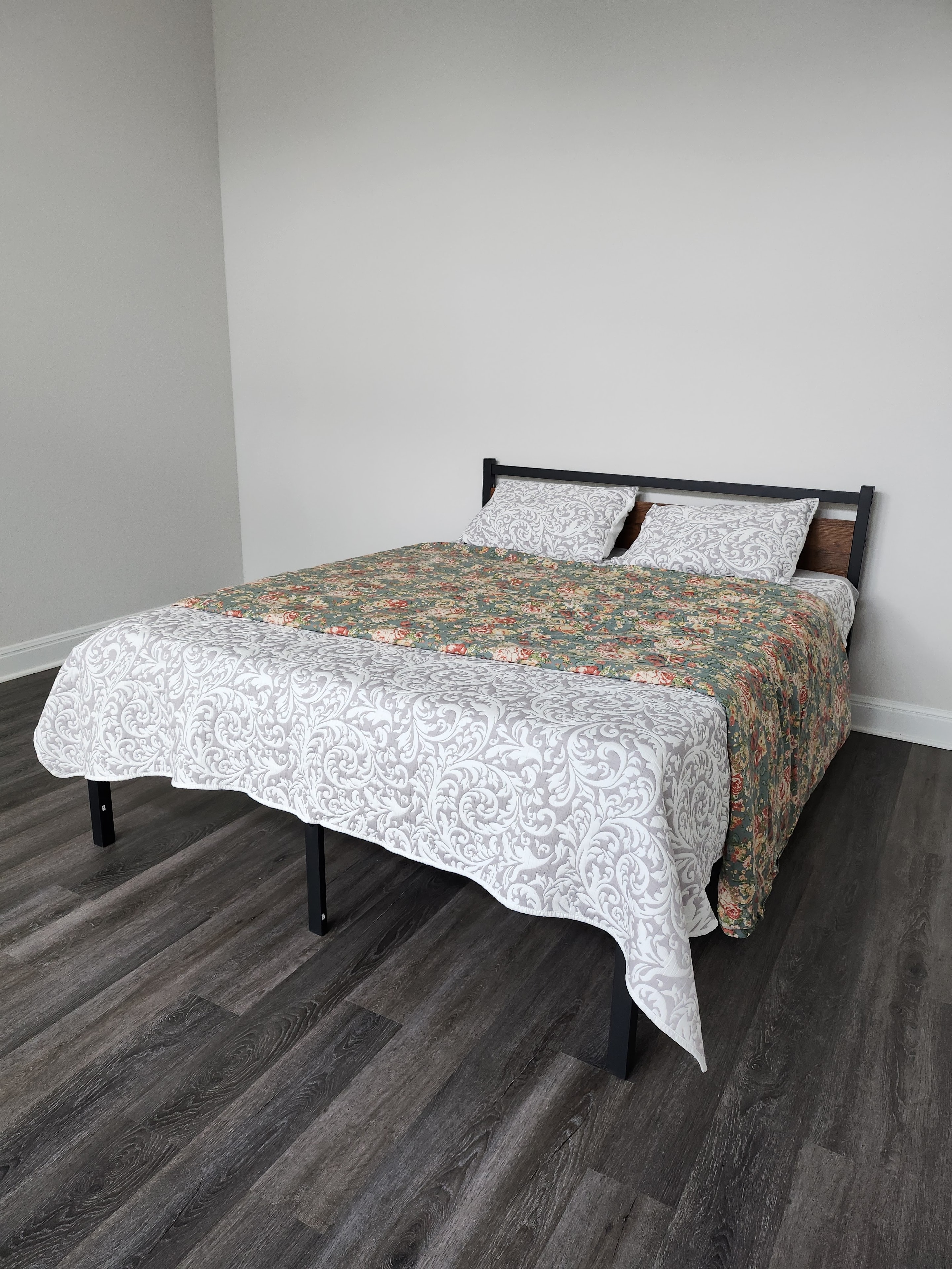 Bedroom with floral comforter